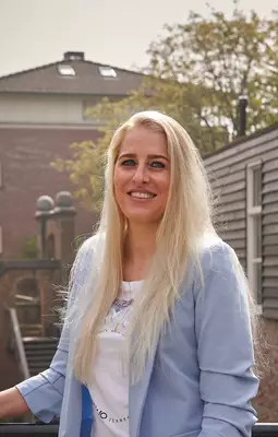 Nadine, medewerker van 10+ makelaars